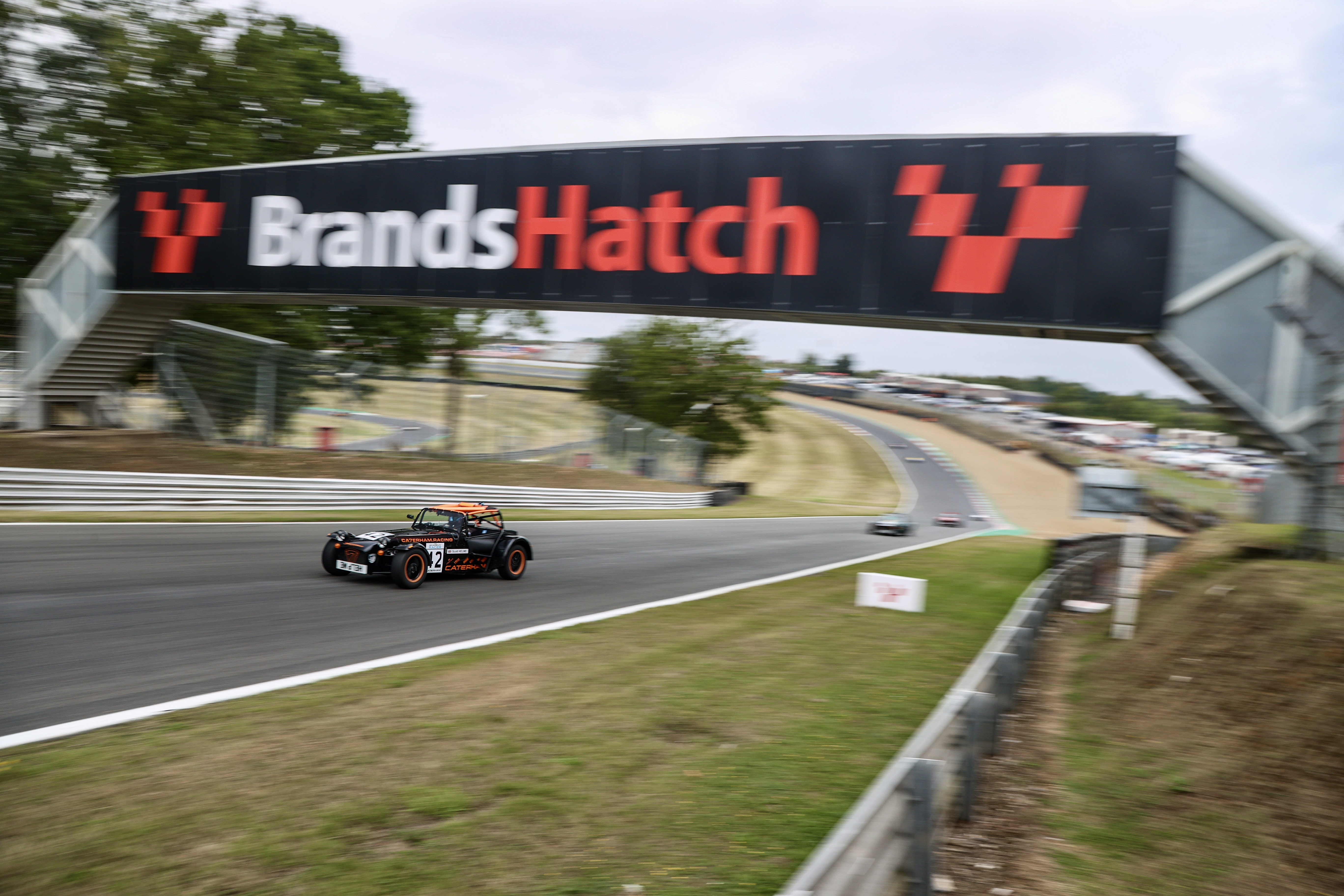 My car driving under the Brands Hatch sign.