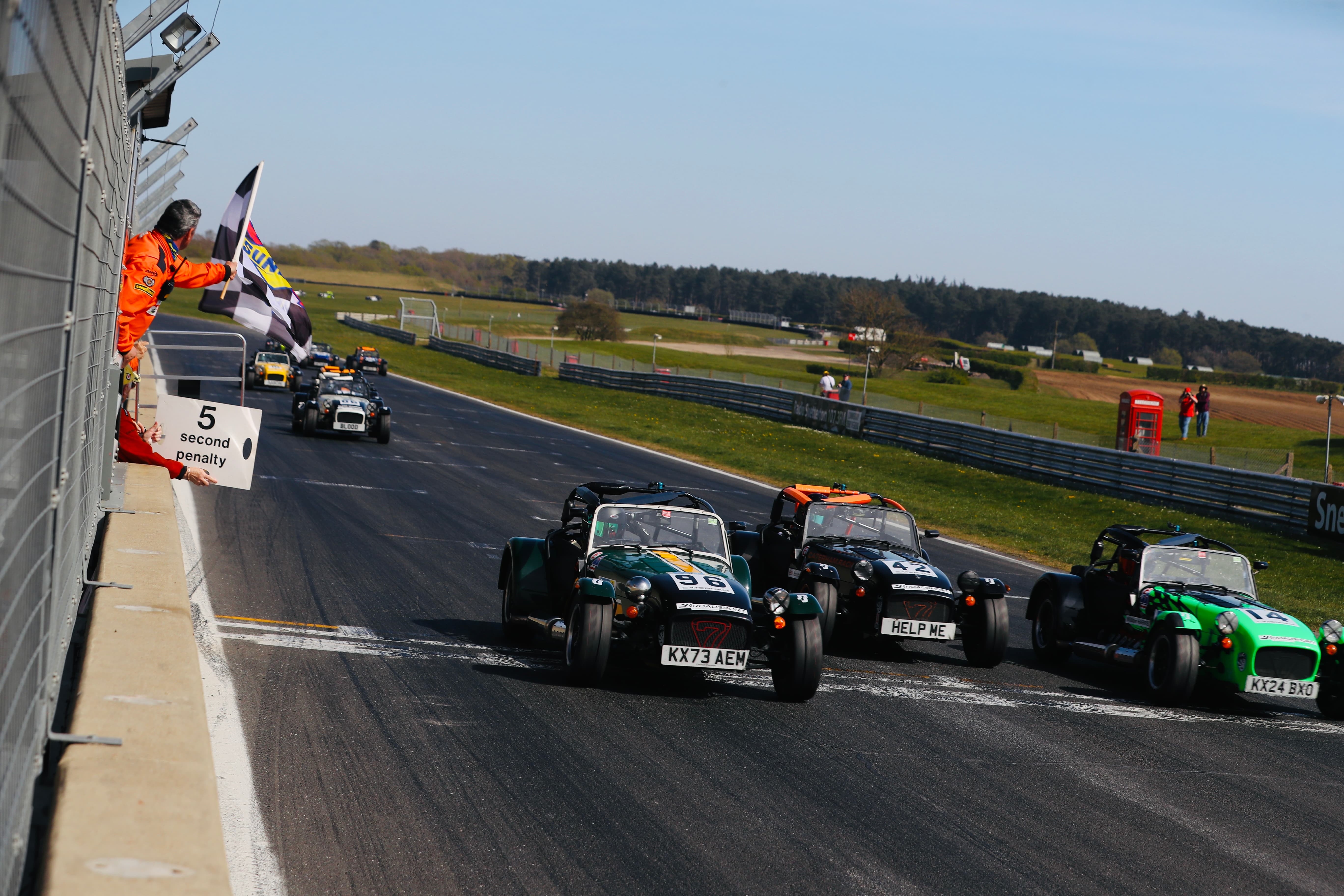 Crossing the line in 3rd position.